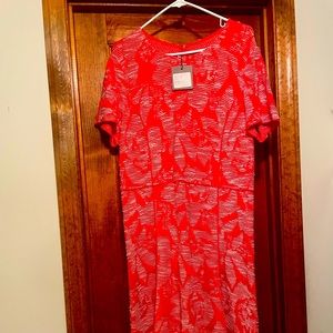 Never worn St. John knit dress.  New with tags.